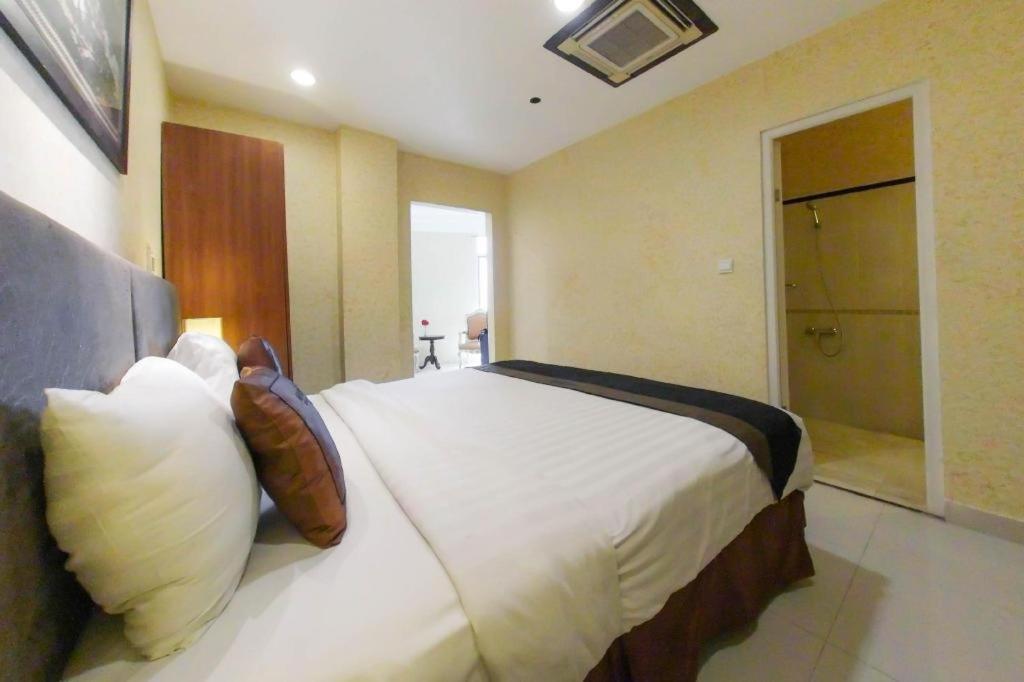 Amos Cozy Hotel Melawai Jakarta Buitenkant foto